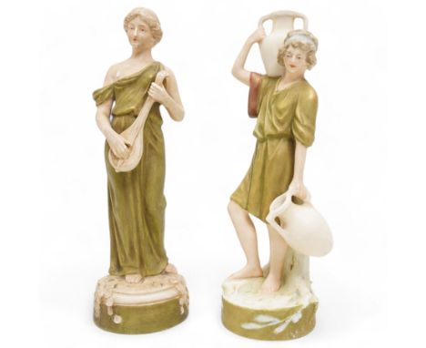 Pair of Royal Dux figures, modelled as a boy carrying pails of water and a lady playing a lute, H25cm 