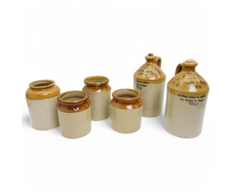 Pair of York interest stoneware flagons by Pearson & Sons, reading 'J.W.S. Sinkinson Botanical Brewers York - buying using or