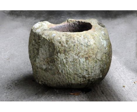 A sandstone trough, of shaped circular outline.  Height 47 cm, diameter +/- 53 cm.