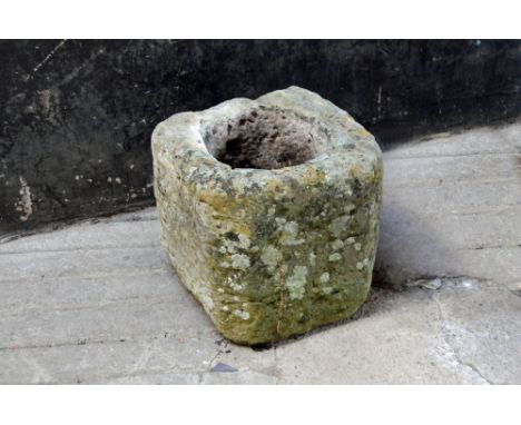 A square form sandstone trough, with canted angles.  Height 38 cm, width 41 cm, depth 42 cm.