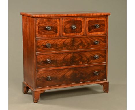 A 19th century mahogany chest of drawers with a rectangular top above three short drawers over three long graduated drawers, 