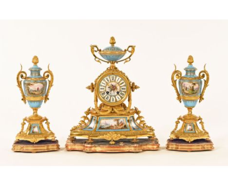 A 19th century French ormolu clock garniture, with Sevres style porcelain panels, the clock with two train striking movement 