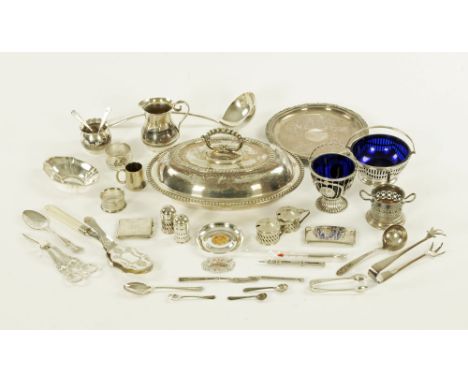A collection of plated ware to include flatware, condiments, a ladle, a tureen dish and other items.
