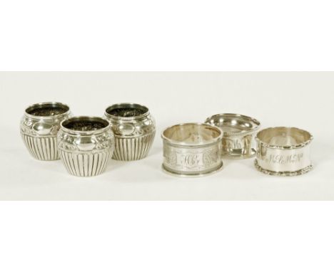 A collection of silver, to include a napkin ring, Birmingham 1902, a further two silver napkin rings and three small silver c