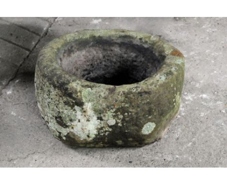 A sandstone trough, roughly circular form.  Height 28 cm, width 50 cm, depth 50 cm.