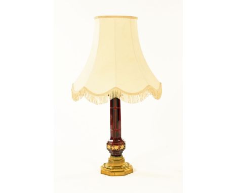 A 19th century bohemian glass oil lamp base, converted to electricity, with stepped brass base.  Height excluding light fitti