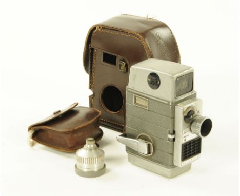 A Bell and Howell auto set 28 mm vintage cine camera, in a brown leather case.