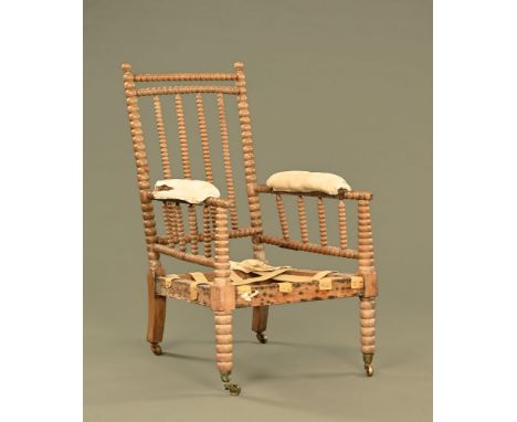 A 19th century bobbin turned armchair, country house type.  Height 103 cm, width across arms 61 cm. CONDITION REPORT: The cha