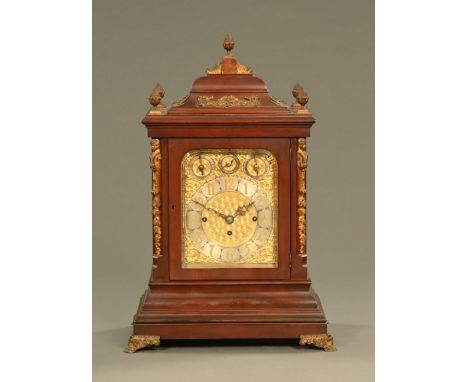 An Edwardian Elliott mahogany cased triple fusee bracket clock, striking on eight bells and five gongs and with silvered bras