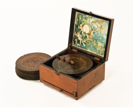 A 19th century German polyphon with quantity of discs. CONDITION REPORT: This polyphon is in working order.  The mechanism do