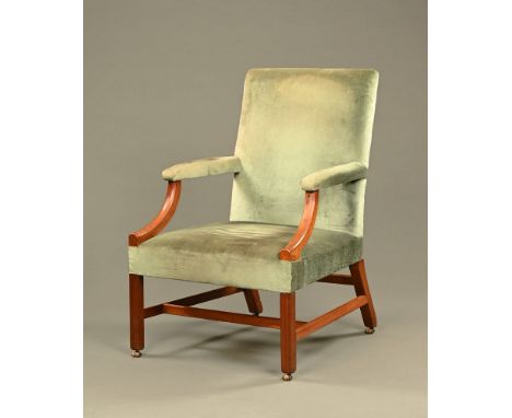 A Georgian mahogany Gainsborough style chair, of large form with upholstered back and seat and raised on legs of square secti