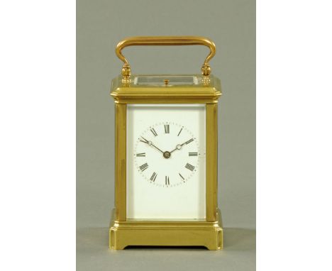 An Edwardian brass carriage clock, with repeat mechanism, timepiece and striking.