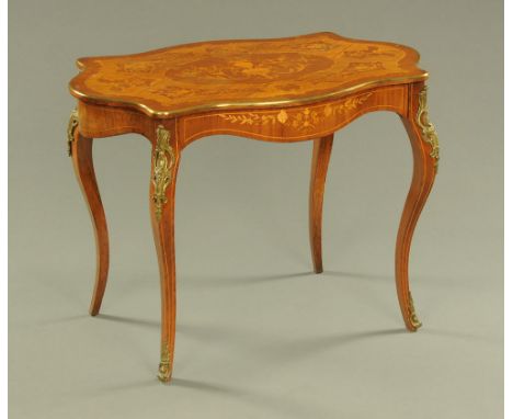 A foliate and scroll marquetry centre table, with urn and cover and bracket to the centre inlaid panel with brass mounted edg