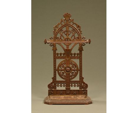 A 19th century cast iron hall stick stand, with pierced back and drip tray.  Height 80 cm, width 44 cm (see illustration).