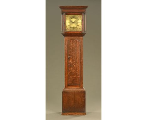 An early 19th century oak longcase clock by Blaylock Longtown, with 30 hour movement, with long trunk door and raised on a pl