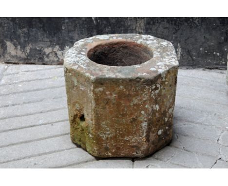 A hexagonal sandstone trough.  Height 40 cm, width 51 cm, depth 51 cm (see illustration).
