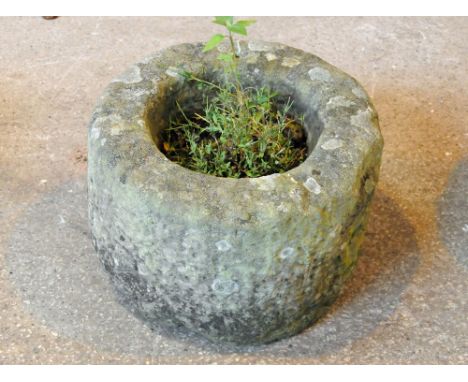 A cylindrical sandstone trough, with drain hole.  Height 31 cm, diameter 51 cm.