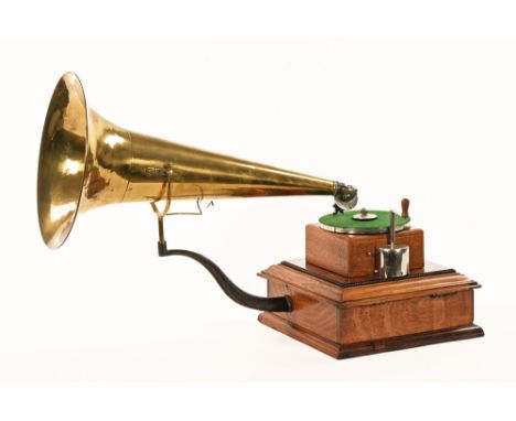 An early 20th century gramophone by Gramophone and Typewriter Limited, with oak and brass horn, together with a single vinyl 