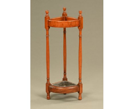 A Victorian mahogany corner stick stand, with metal drip tray.  Height 80 cm, width 31 cm.