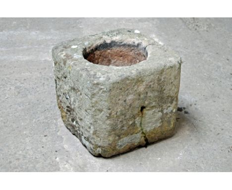 A sandstone trough, square form with canted angles.  Height 42 cm, width 46 cm, depth 48 cm.