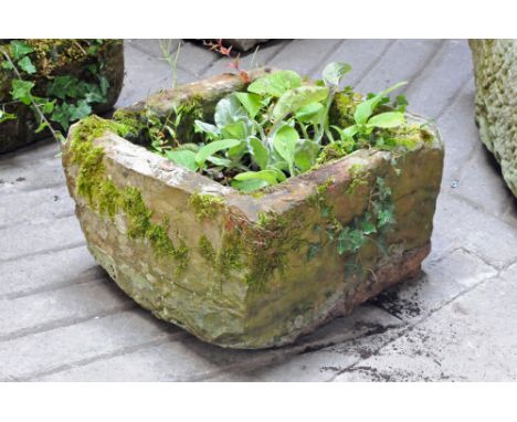 A rectangular sandstone trough.  Height 30 cm, width 50 cm, depth 46 cm.
