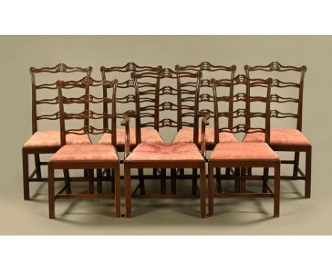 A set of seven Edwardian George III style ladder back dining chairs, one carver arm and six singles, of large form, each with