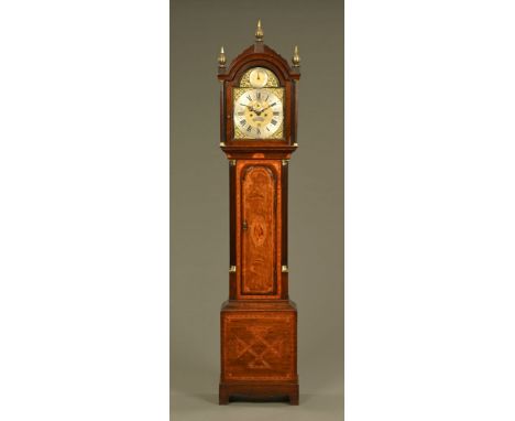 A George III oak and inlaid longcase clock by Henry Wade London, with two train striking movement, the case with long arched 