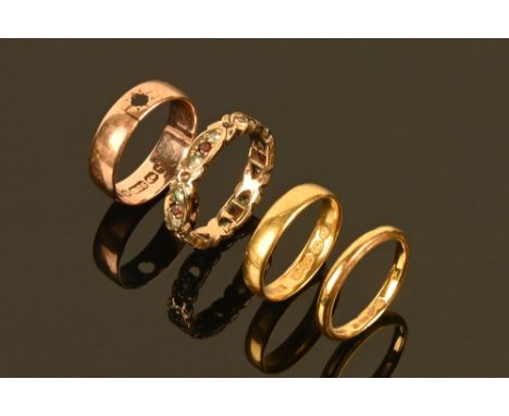 Four rings, two 22 ct gold wedding bands both Size K, 2.9 grams gross and 3.5 grams respectively, another 9 ct gold 2.8 grams