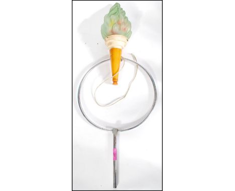 A mid 20th Century retro vintage Odeon / ABC cinema style light in the form of an Olympic torch, the lamp comprises of a yell