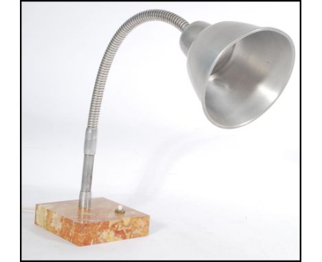 A retro 20th Century Art Deco deck lamp, set to a marble square base with an Aluminium conical shade raised on a goose-neck s