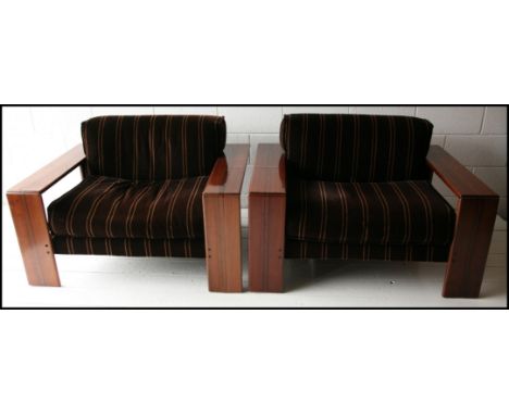 A rare pair of 1970s ' Artona ' dark wood armchairs. Designed by Afra &amp; Tobias Scarpa for Maxalto. With original black an