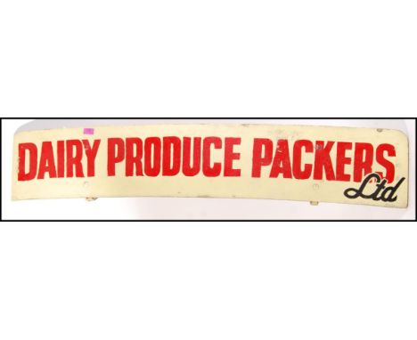 A large 1970's retro vintage hand painted sign for Dairy Produce Packers LTD being arched with white ground and red lettering