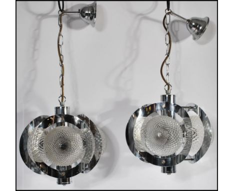 A mid 20th Century pair of wall hanging ceiling chandelier / lights having a central&nbsp; polished aluminium column surround