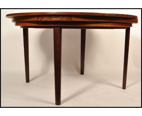 Dyrlund - Lotus ' flip flap ' - A superb 1960's Danish retro vintage teak wood round extending dining table raised on round t