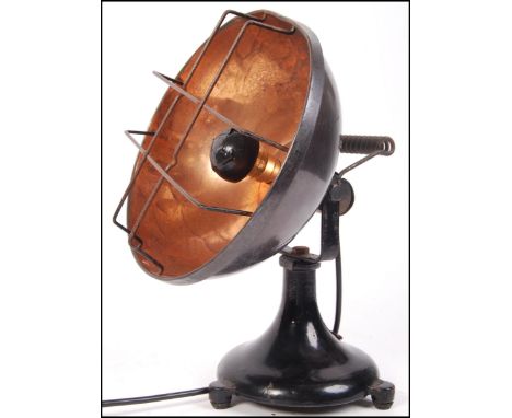Ediswan - An Art Deco era Circa 1920 ebonised industrial cast iron and copper heat lamp having a thin tapering stem supportin