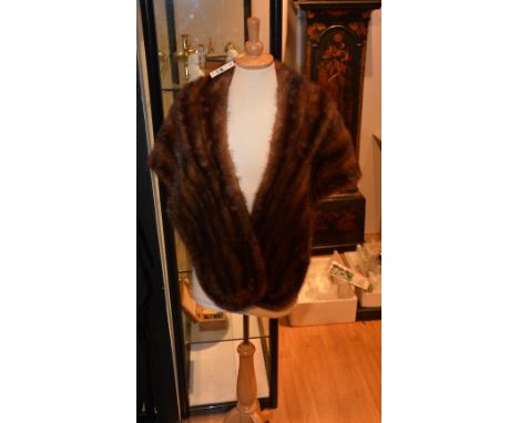 A vintage mink fur wrap, in traditional brown