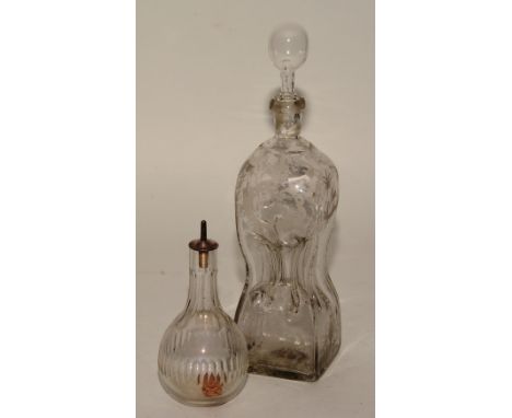 A Georgian etched glass decanter, with later stopper, decorated with panels of deer in foliage, 29cm high, also with glass sc