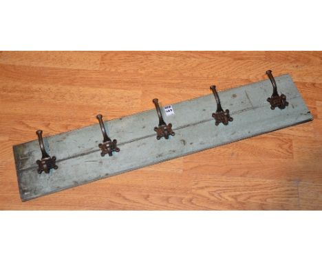 A vintage painted wall mounting hat & coat rack, GNER plaque to back of the five metal hooks, 7cm high x 80.5cm wide