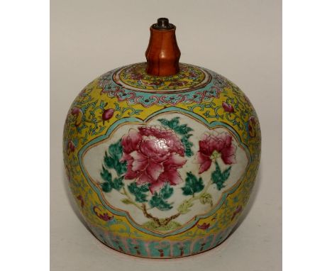 A late 19th/ early 20th century Chinese famille rose vase converted to table lamp, decorated with central panels of birds and