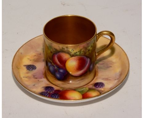 A Royal Worcester cabinet cup with saucer signed by H Everett circa 1924, the cup and saucer decorated with fruit and berries