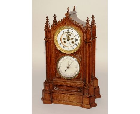 A 19th century oak cased bracket clock with barometer by Luppens & Co of Brussells & Paris, with four spire finials to the to