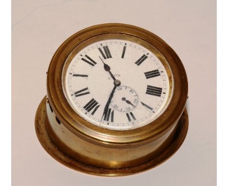 A French patent brass cased eight day desk clock, the white enamel dial with Roman numerals, minute track and subsidiary seco
