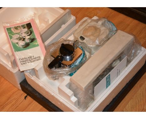 A vintage teasmade by Goblin, with original packaging and instruction booklet, also with boxed set of ten vintage glass hydro