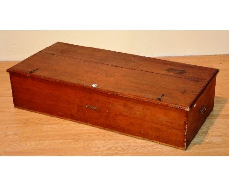 A vintage pine blanket box, with hinged top, metal catches and carry handles, 26cm high x 117cm wide x 57cm deep
