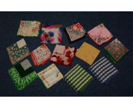 A large collection of vintage silk and chiffon pocket handkerchiefs, all of different designs, circa 1920's onwards (659) app