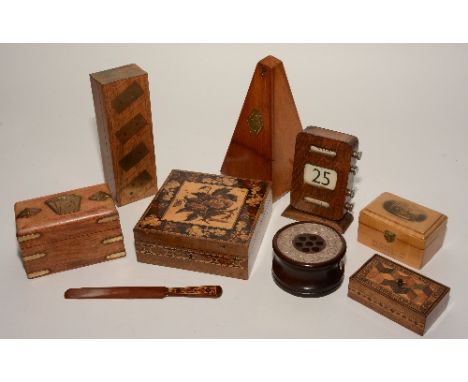 A mixed lot of decorative wood items, to include mauchline ware box, French metronome, vintage desk calendar, pipe stand with