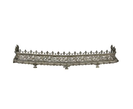 A 19TH CENTURY 'GOTHICK' HEAVY CAST CURB FENDER, of shaped bowfront form, decorated with entwined foliage and vines, on brack