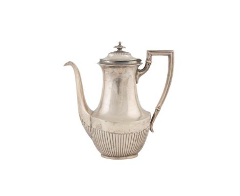 AN AMERICAN STERLING STANDARD SILVER COFFEE POT, stamped J.E. Caldwell & Co, of baluster form, with repousse, chased and engr