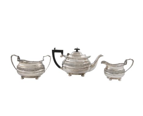 A SILVER THREE-PIECE TEA SERVICE, Chester 1913, mark of George Nathan & Ridley Hayes, of oblong form, comprising: teapot, sug