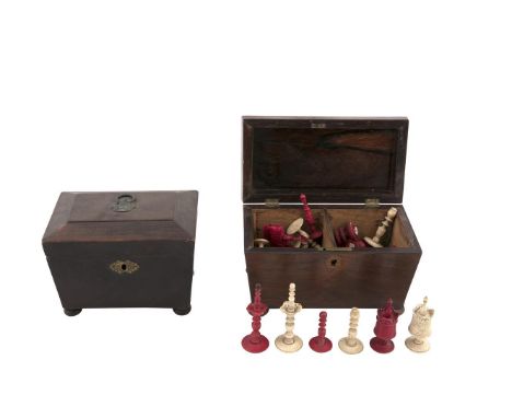 A WILLIAM IV ROSEWOOD SARCOPHAGUS SHAPED TEA CADDY, on bun feet; together with a smaller similar tea caddy. (2)